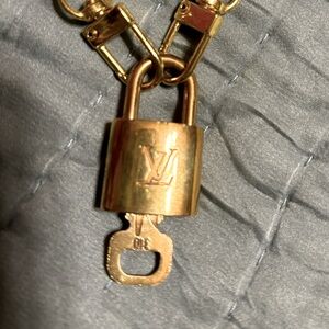 Authentic LOUIS VUITTON Lock & Key